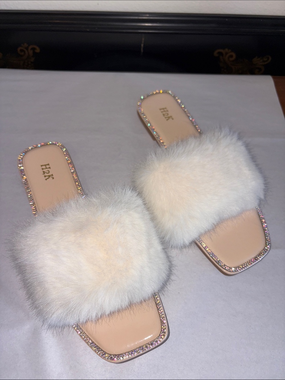 slides with white faux fur and rhinestones